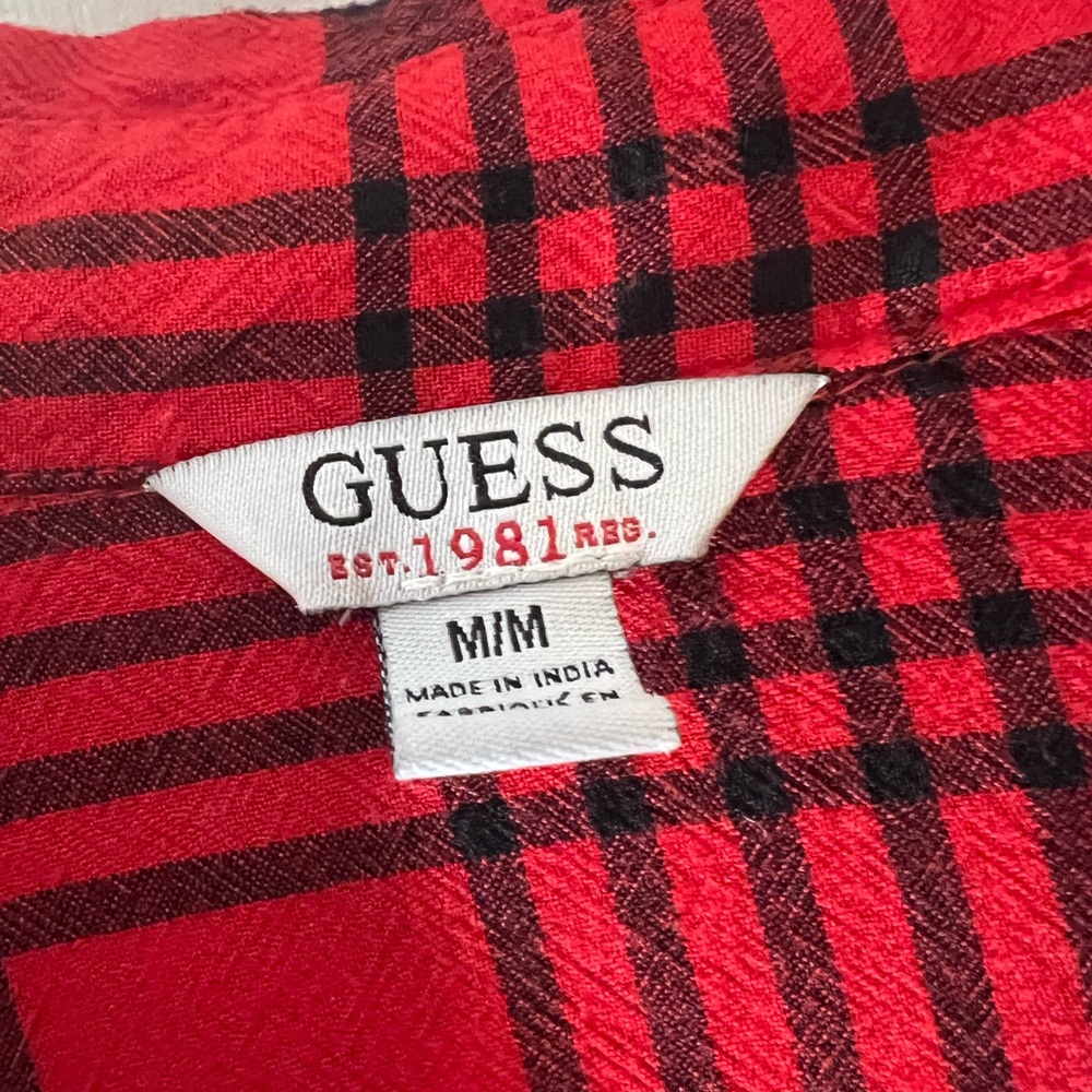 Button up plaid dress with pockets.